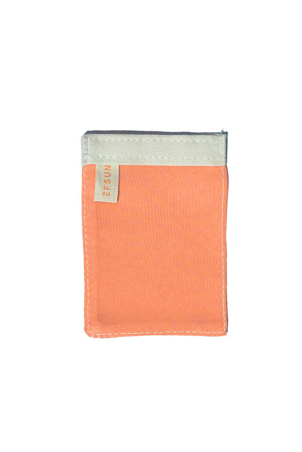 Orange fabric pouch with a gray top section on a white background